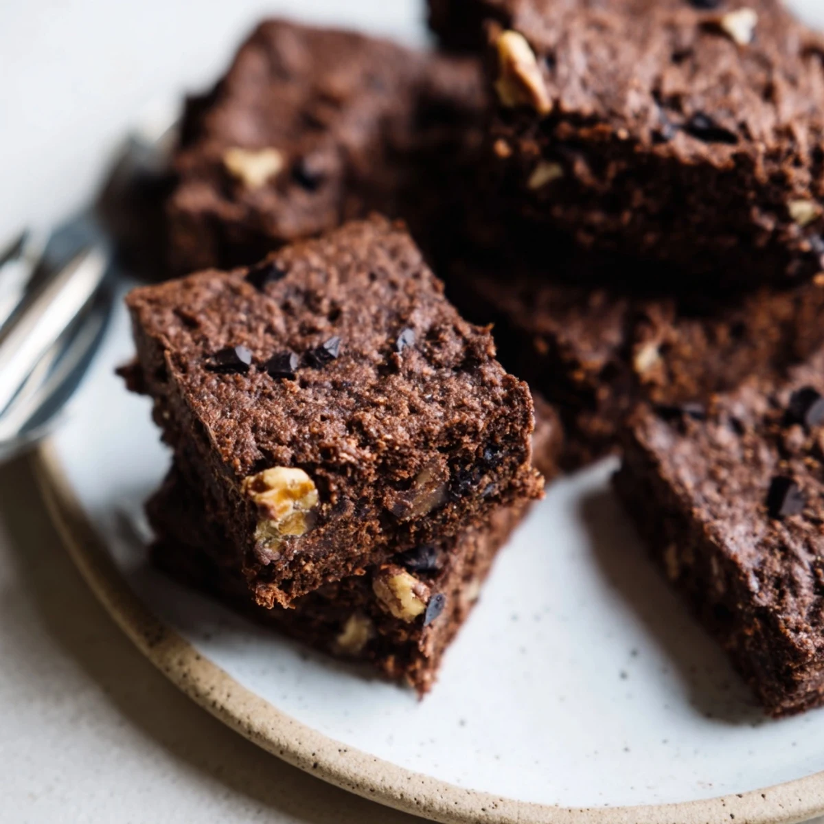 Decadent Zero-Waste Brownies using nut-milk pulp, served warm with vegan ice cream.  