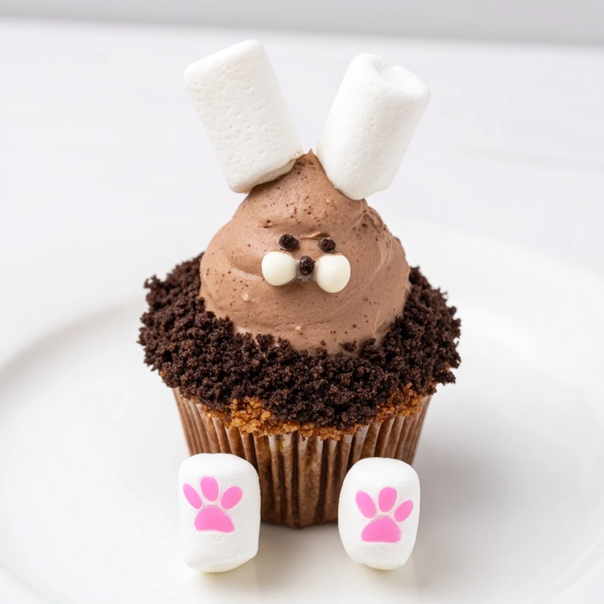 Bunny Burrow Cupcake Tray: charming frosted cupcakes portraying adorable bunnies peeking from their chocolate "burrows."