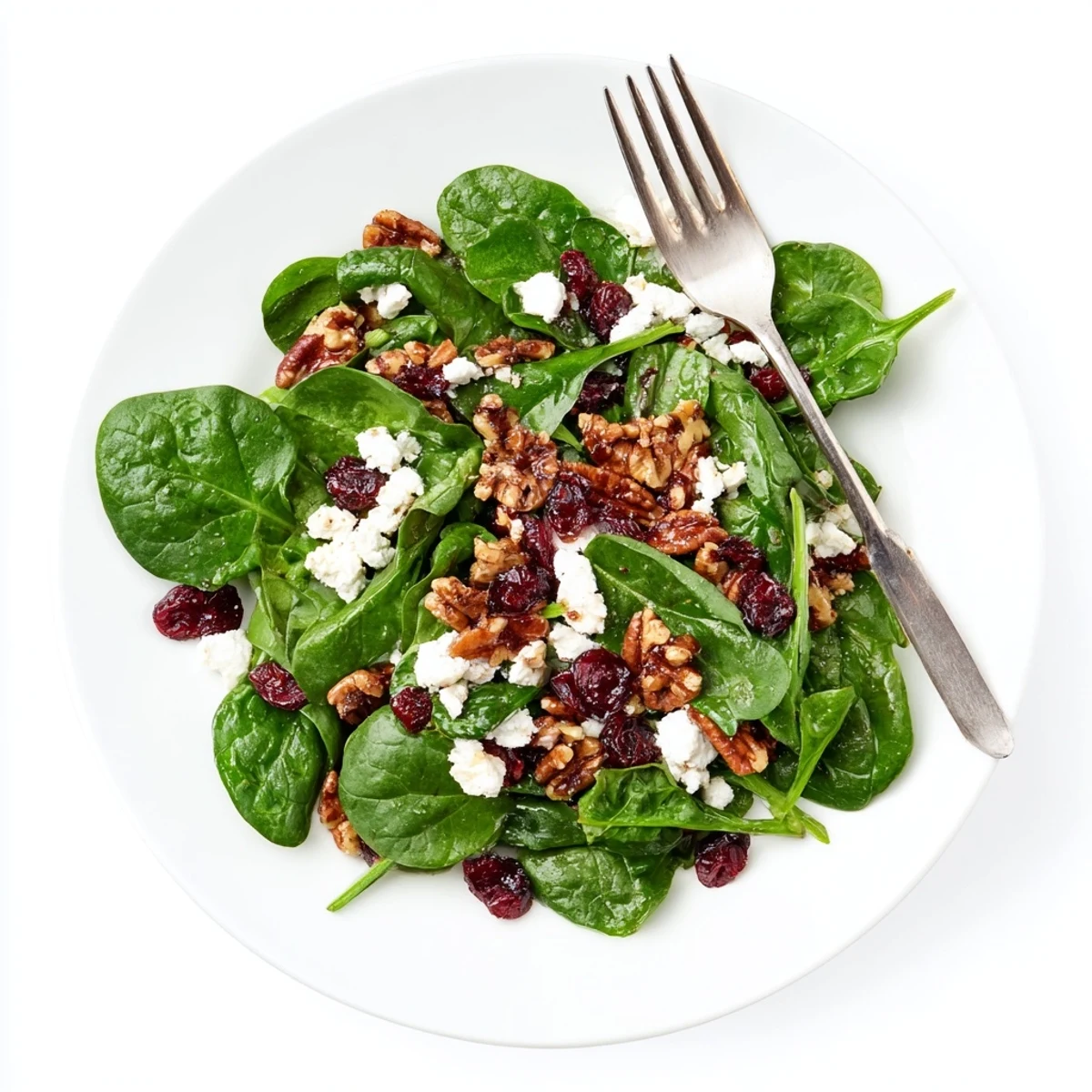 A plated Spinach Goat Cheese Salad, an easy vegetarian lunch with tender greens and tangy, sweet flavors.