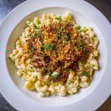 Smoky barbecue flavors merge with cheesy Barbecue Pulled Pork Mac and Cheese, baked until bubbly perfection.