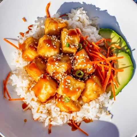 Golden, crispy Chili-Mayo Baked Tofu Bowls served over fluffy rice, ready for a flavorful bite.