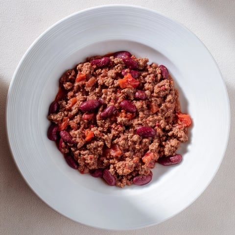 Savory Secret 4-Ingredient Slow Cooker Chili, steaming hot and ready, perfect for a cozy dinner.