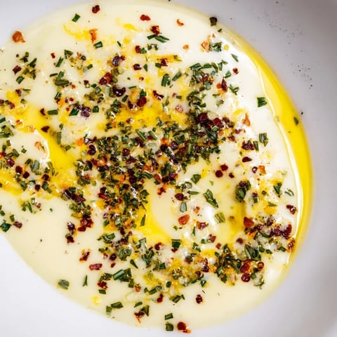 Creamy Cowboy Butter Sauce, bubbling in a saucepan, ready to drizzle over a perfectly grilled steak.