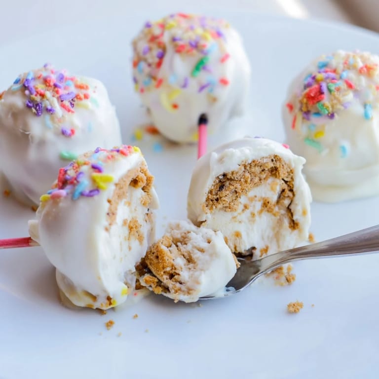 Whimsical Cream Soda Spiced Biscuit Pops, golden and creamy, perfect for parties.  